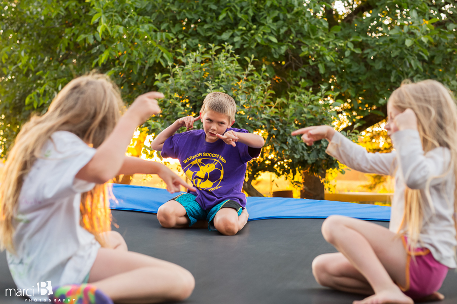 kids on trampoline - children's photography