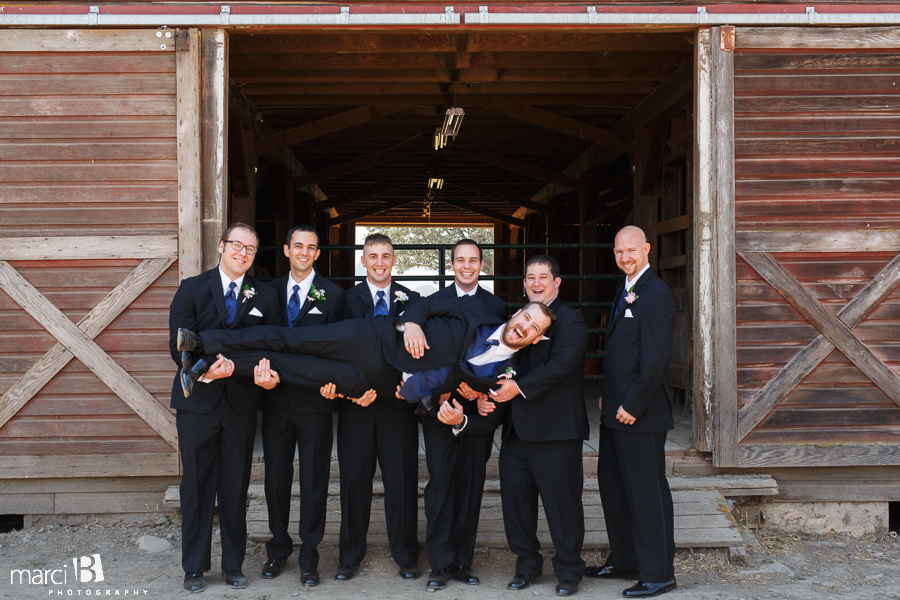 Groom and groomsmen - red barn