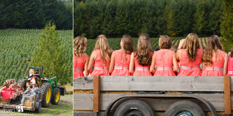 Country wedding - bride and groom on tractor - wedding party in trailer