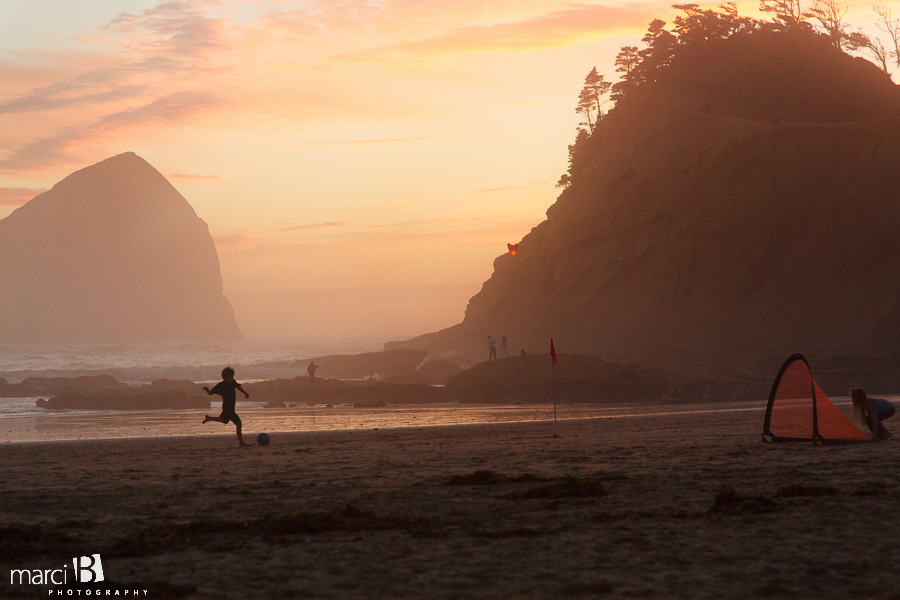 Cape Kiwanda - Oregon Coast sunset - playing soccer on the beach