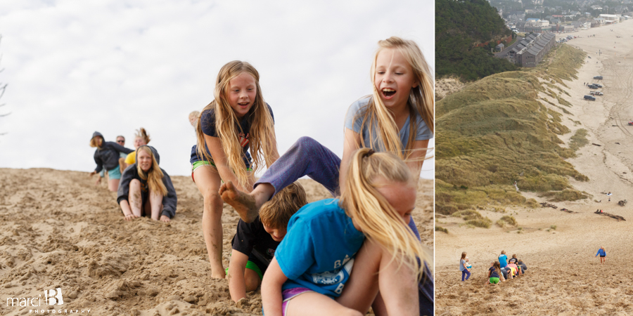 Playing on the dunes - Children's photographer - Oregon Coast - leapfrog down a sand dune