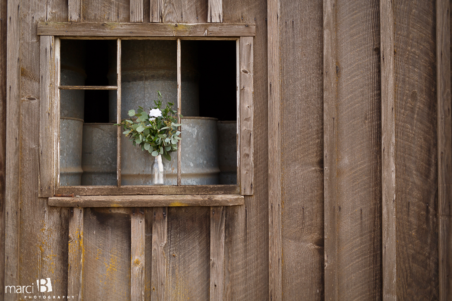 wedding bouquet in barn window