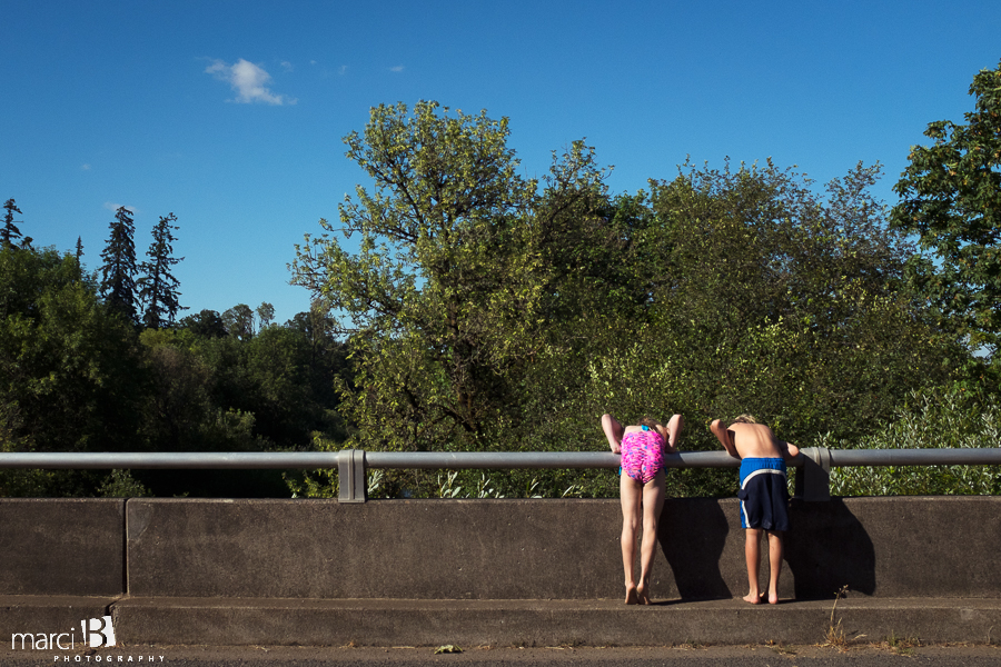 kids looking over bridge - Willamette River - summer days