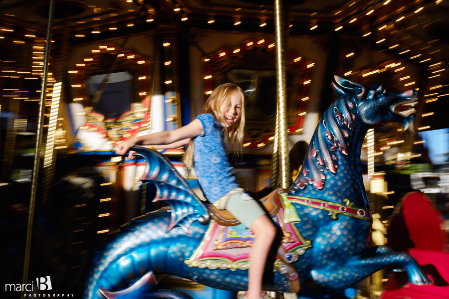 summer nights - kids on carnival ride - fair - St. Paul Rodeo - girl on carousel