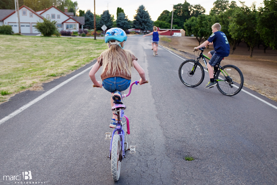 girl riding bike - family time - country life - lifestyle photography