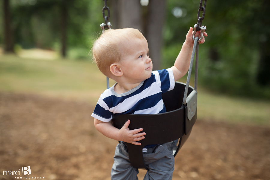 One year old photos - toddler in swing - boy in swing