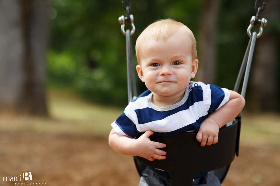 One year old photos - toddler in swing - boy in swing