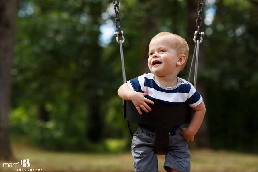 One year old photos - toddler in swing - boy in swing