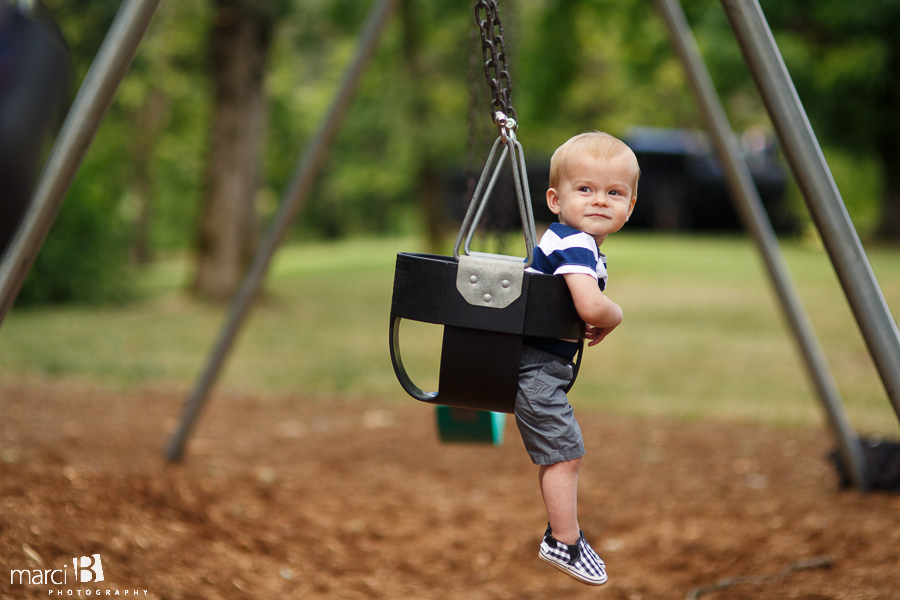 One year old photos - toddler in swing - boy in swing