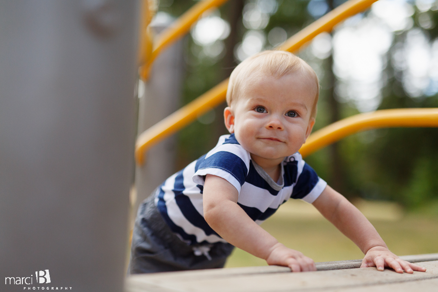 one year old photos - toddler on playground