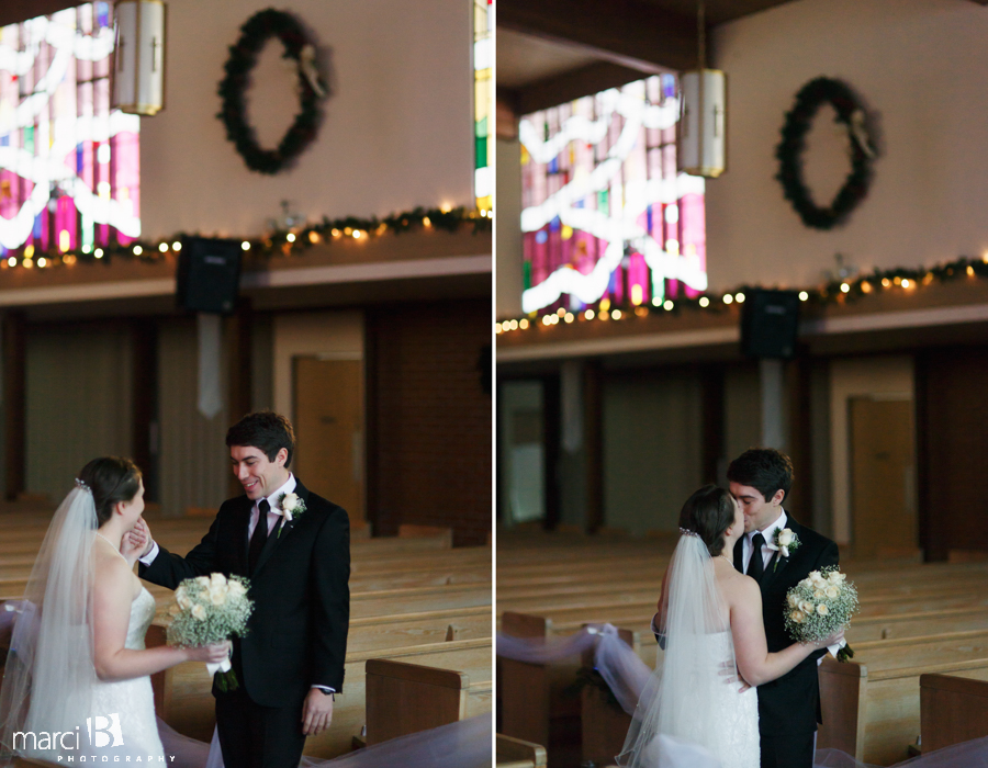 first look - groom sees bride for first time - portraits in sanctuary