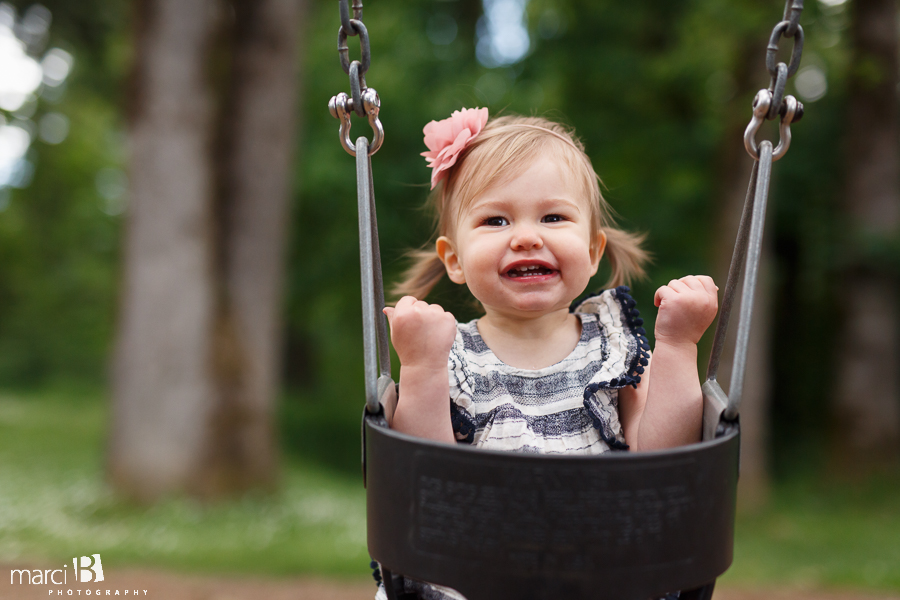 pictures of toddler in swing - Corvallis family photos