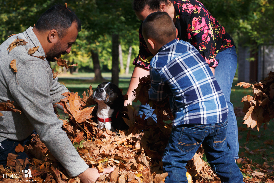 fall family photos - Corvallis photography - family photographer - photos of kids playing in leaves - boys in plaid