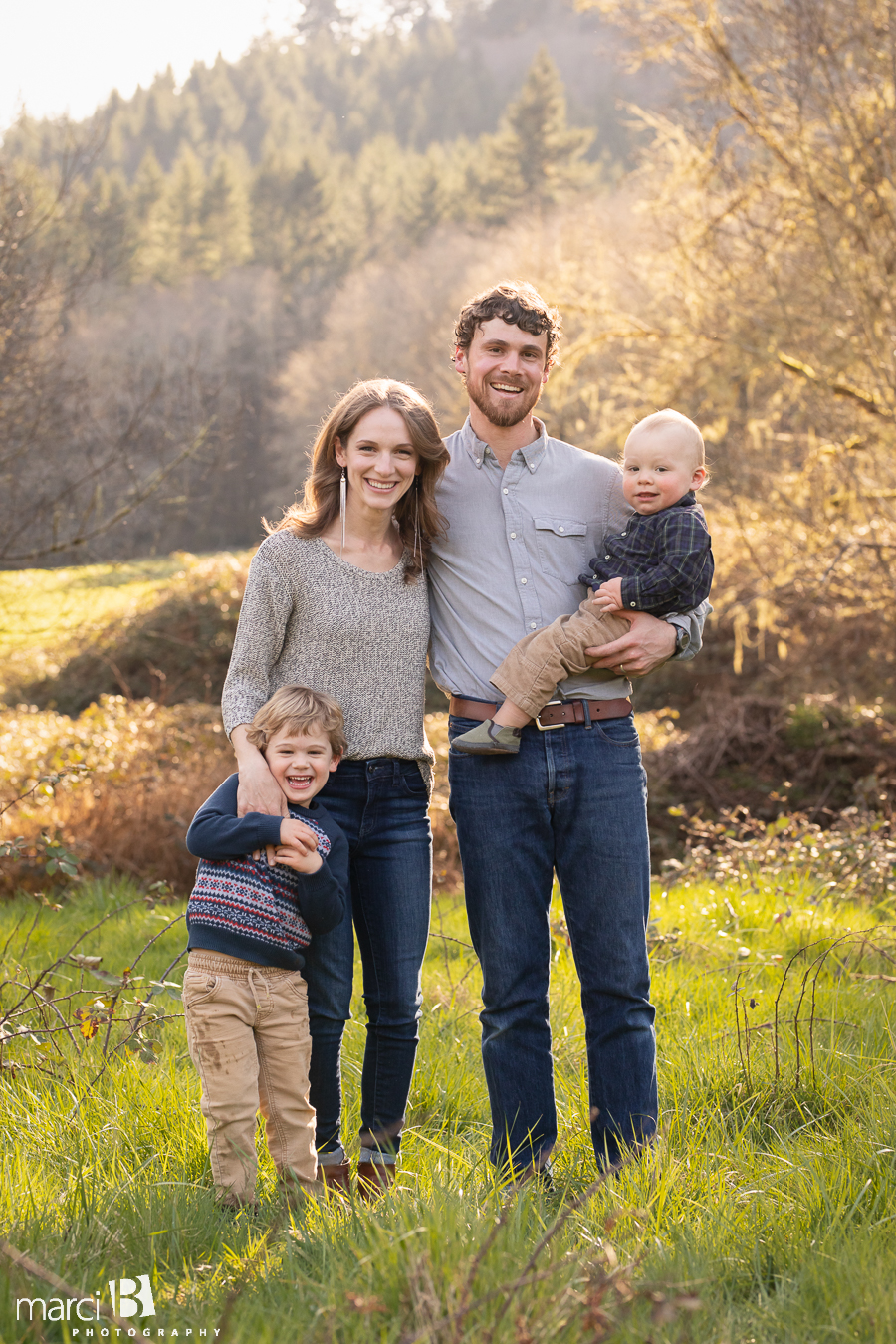 family photographer takes pictures of family with two young boys in Oregon Coast Range - Corvallis professional photographer