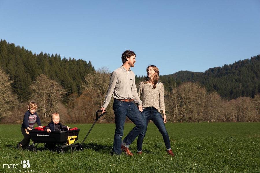 family photographer takes pictures of family with two young boys in Oregon Coast Range - Corvallis professional photographer