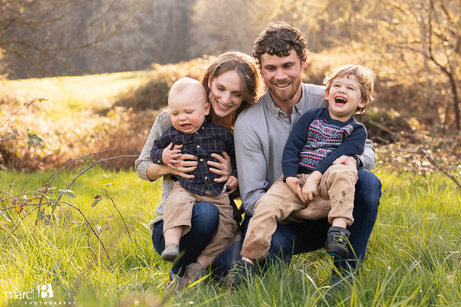 family photographer takes pictures of family with two young boys in Oregon Coast Range - Corvallis professional photographer