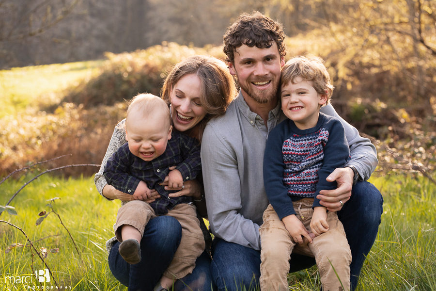 family photographer takes pictures of family with two young boys in Oregon Coast Range - Corvallis professional photographer