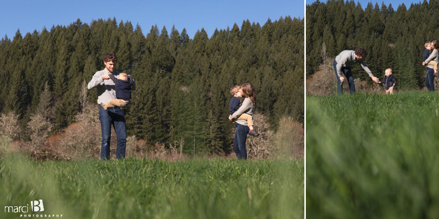 family photographer takes pictures of family with two young boys in Oregon Coast Range