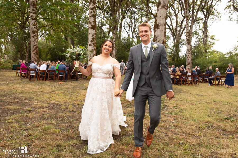 happy bride and groom after ceremony