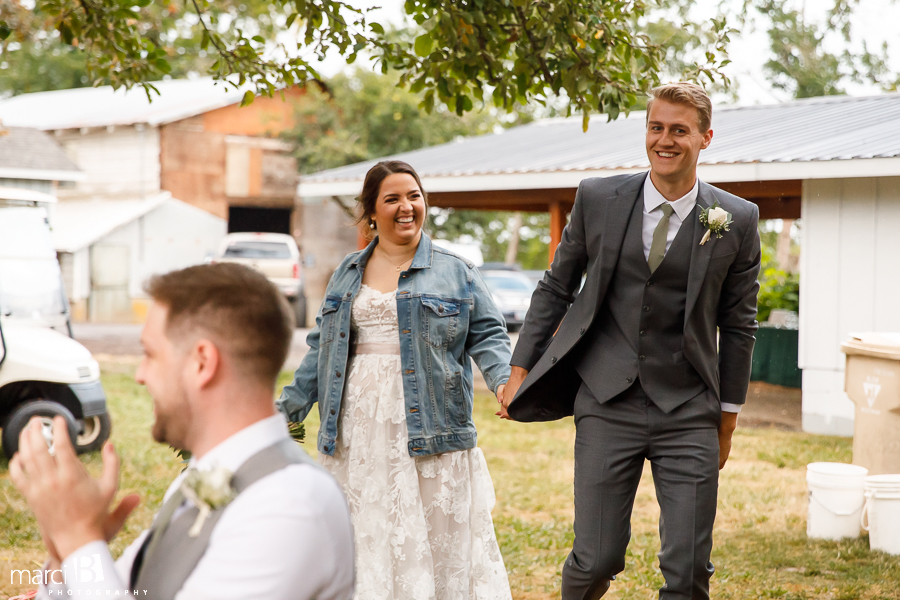 bride and groom enter reception