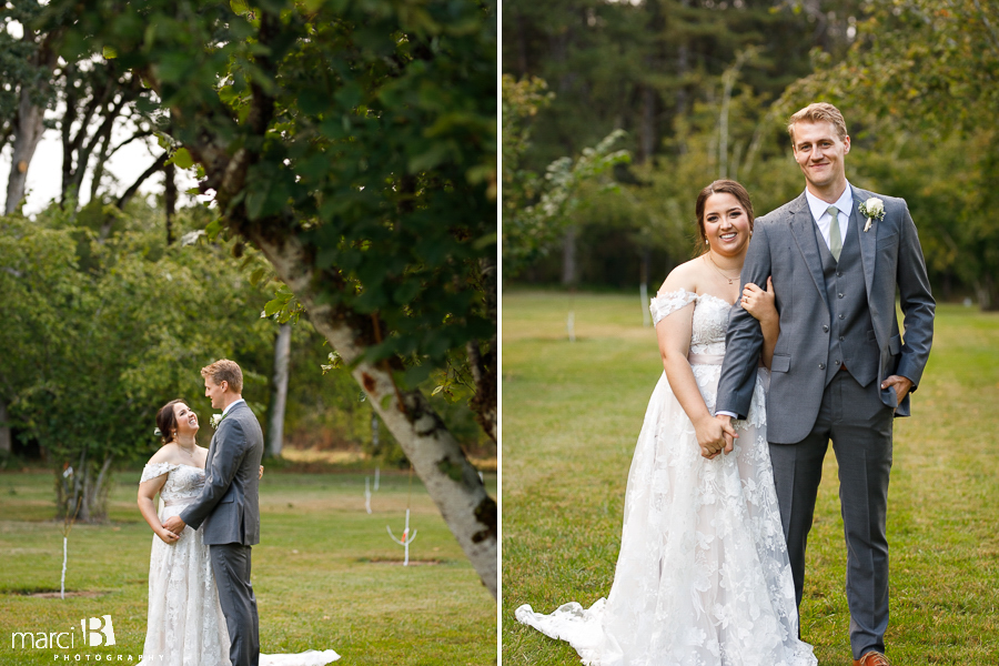 bride and groom photos in apple orchard in corvallis wedding